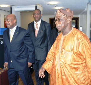 Ambassador Ayo Olukanni (Charge DAffaires Embassy/Permanent Mission of Nigeria Vienna) and Mr. Paul Marceli, UNIDO Representative, welcome Former President Olusegun Obasanjo on arrival at the VIP Terminal Vienna International Airport Ambassador Ayo Olukanni (Charge DAffaires Embassy/Permanent Mission of Nigeria Vienna) and Mr. Paul Marceli, UNIDO Representative, welcome Former President Olusegun Obasanjo on arrival at the VIP Terminal Vienna International Airport